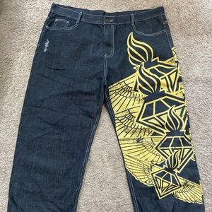 Baggy Jessie Pinkman black jeans with embroidery and yellow wings, jnco style